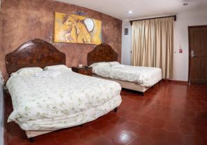 Hotel Posada del Rey客房内的一张或多张床位