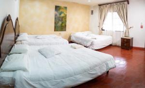 Hotel Posada del Rey客房内的一张或多张床位