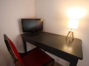 TV a/nebo společenská místnost v ubytování Gîte cosy au cœur de la nature vosgienne - FR-1-589-805