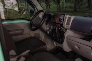 a dashboard of a car with a steering wheel at Camper Van for Rent-Mini , El Nido in El Nido