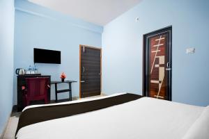 Μια τηλεόραση ή/και κέντρο ψυχαγωγίας στο Super Hotel O Spacious Villa +22 φωτογραφίες