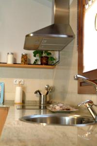 Η κουζίνα ή μικρή κουζίνα στο Apartamentos Casa Vidal +35 φωτογραφίες