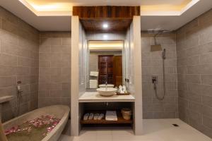 a bathroom with a sink and a shower at Sunflower Angkor Boutique Hotel in Siem Reap +11 photos