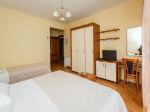 Posteľ alebo postele v izbe v ubytovaní Hotel Adria