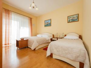 Posteľ alebo postele v izbe v ubytovaní Hotel Adria