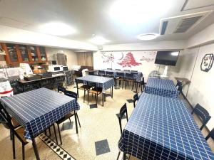 TV a/nebo společenská místnost v ubytování Business Inn Sennichimae Hotel
