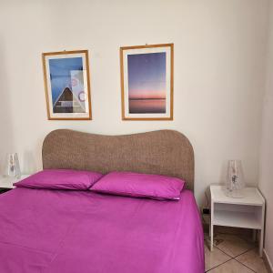 Katil atau katil-katil dalam bilik di Casa Atena, spaziosa, romantica con idromassaggio privato