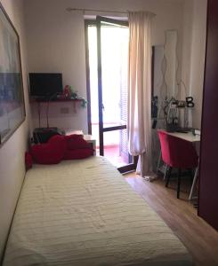 Postel nebo postele na pokoji v ubytování Casa Audrey + 1 fotografie