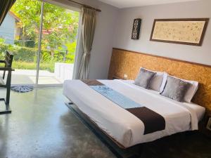 Postelja oz. postelje v sobi nastanitve The Hip Resort @ Phi Phi