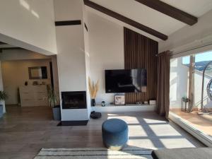 TV a/nebo společenská místnost v ubytování Guest House Galeb2