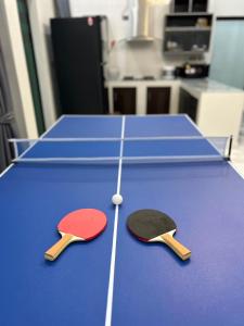 Stolní tenis v ubytování Moon Nine Village Khao Yai nebo okolí