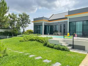 Zahrada ubytování Moon Nine Village Khao Yai