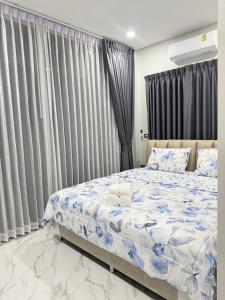 Postel nebo postele na pokoji v ubytování Moon Nine Village Khao Yai + 17 fotografií