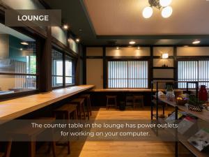 Posezení v ubytování BUNA KUSATSU Onsen Inn
