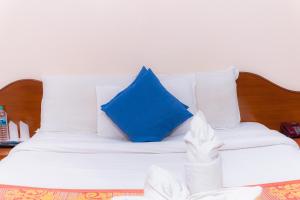 Voodi või voodid majutusasutuse Amber Royel Hotel toas