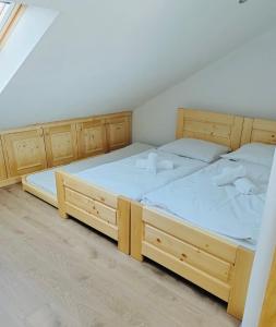Postel nebo postele na pokoji v ubytování Hotel & wellness Hejtmanka