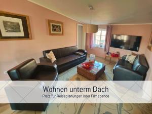 Μια τηλεόραση ή/και κέντρο ψυχαγωγίας στο BUDDE4 Fewo Katja - Early Check-in, extralange Betten 220 cm, separates WC