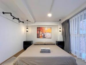 Postel nebo postele na pokoji v ubytování Zeus Living - Harmony Hideout