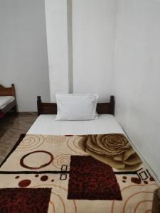 Postel nebo postele na pokoji v ubytování Rv Budget Hostel