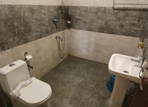 Baðherbergi á Serenpark Resort Jorhat