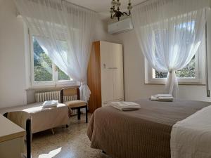 Postel nebo postele na pokoji v ubytování BeeLiving Room&Breakfast