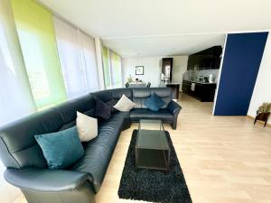 Posezení v ubytování Wohnung mit Klimaanlage Zürich & Airport nah