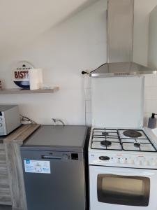 Kuchyň nebo kuchyňský kout v ubytování Appartement T3 60m2 calme