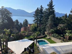 an aerial view of a house with a swimming pool at Relais Villa Margherita in Oggebbio