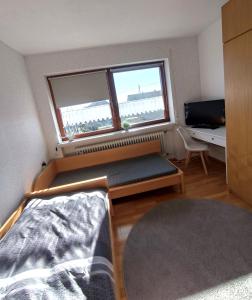 TV a/nebo společenská místnost v ubytování Ferienwohnung König