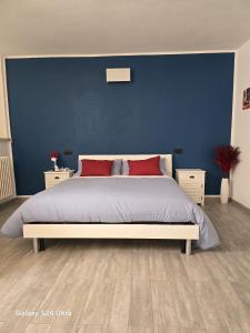 Postel nebo postele na pokoji v ubytování Il Cortile di Assisi