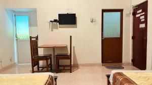 TV a/nebo společenská místnost v ubytování Home Living Unit