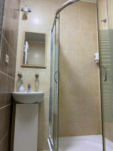 Ένα μπάνιο στο Luxory & Spa Apartman