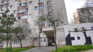 an apartment building with a hallway leading to it at LUXURY studio PLAZA M DRUMUL TABEREI in Bucharest