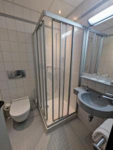 Koupelna v ubytování DLRG Tagungszentrum Hotel Delphin