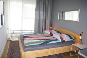 Postel nebo postele na pokoji v ubytování Tiny Atelier Leihfahrräder Gratis Shuttleservice + 13 fotografií
