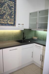 Kuchyň nebo kuchyňský kout v ubytování Tiny Atelier Leihfahrräder Gratis Shuttleservice