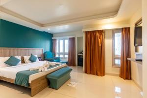 Ένα ή περισσότερα κρεβάτια σε δωμάτιο στο Hotel Amer Palace +18 φωτογραφίες