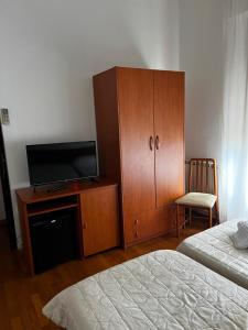 Postel nebo postele na pokoji v ubytování Hotel Mediterraneo