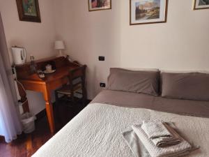 Postel nebo postele na pokoji v ubytování B&B Federica