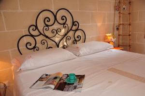 Postel nebo postele na pokoji v ubytování Alba Bed & Breakfast