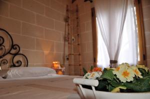 Postel nebo postele na pokoji v ubytování Alba Bed & Breakfast