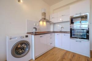 Kuchyňa alebo kuchynka v ubytovaní Relax & Luxury A4 apartment + 26 fotografií