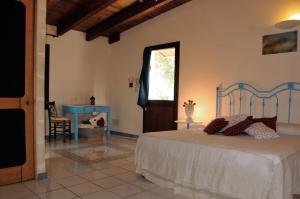 Postel nebo postele na pokoji v ubytování Alba Bed & Breakfast