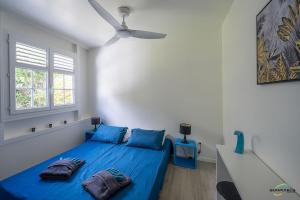 Postel nebo postele na pokoji v ubytování Villa An ti kwen paradi 3 chambres avec piscine et vue mer + 37 fotografií