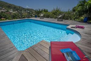 Kolam renang di atau di dekat Villa An ti kwen paradi 3 chambres avec piscine et vue mer