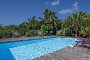 Kolam renang di atau di dekat Villa An ti kwen paradi 3 chambres avec piscine et vue mer