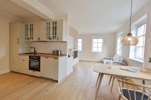 Nhà bếp/bếp nhỏ tại Kleines Piratennest - Am Meer +6 ảnh