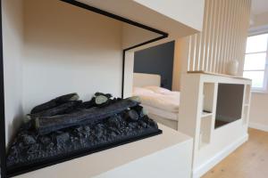 Giường trong phòng chung tại Kleines Piratennest - Am Meer