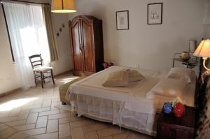 Postel nebo postele na pokoji v ubytování Alba Bed & Breakfast