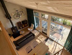 an overhead view of a living room with a couch and a table at Vieux Sart 34, chez Dame Béa in Stavelot